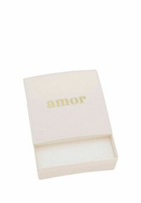 Pequeña caja cuadrada de color crema con la palabra "amor" en letras doradas en la tapa, ligeramente abierta mostrando un interior vacío.