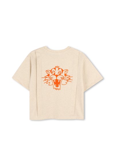 Beige cotton t-shirt with a loose fit and short sleeves. Features an orange tiger face print on the back. Smooth texture, simple design.