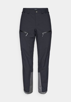 Navy outdoor pants with a smooth texture, two zippered front pockets, and grey accents near the cuffs. Features a standard waistband and belt loops.