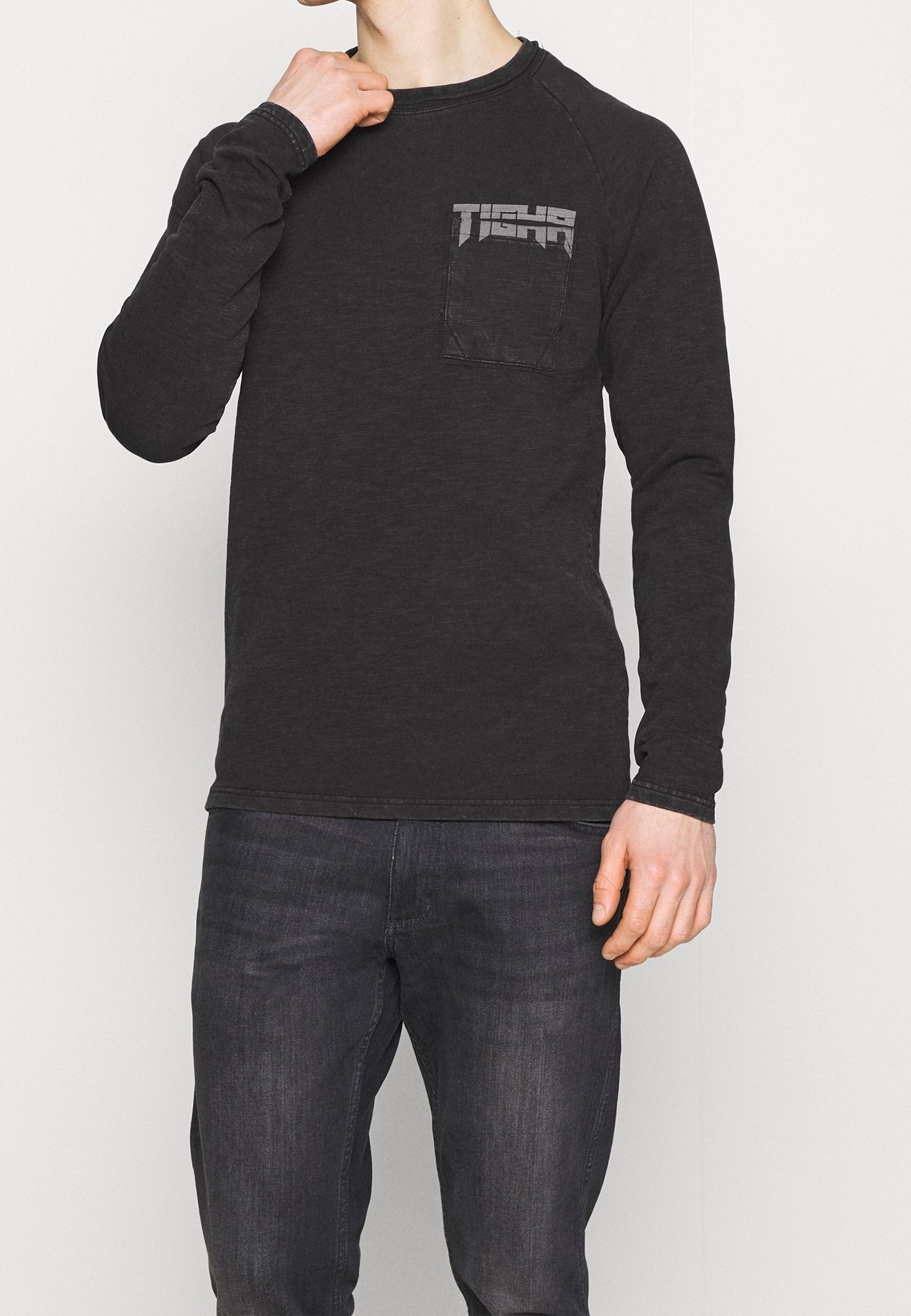 Tigha Sweatshirt black/schwarz (Pre-owned) Zalando