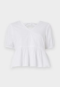 Fehér peplum blúz, pamutból készült, rövid puffos ujjakkal, sekély V-kivágással és hátsó megkötővel. Simább textúra, laza dizájn.