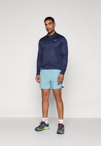 Nike Performance CHALLENGER - Sportske kratke hlače - denim turquoise/glacier blue/black