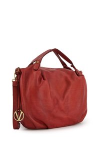 Red leather handbag with a soft, textured surface, rounded shape, dual top handles, adjustable shoulder strap, and gold hardware accents.