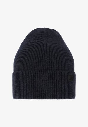 Navy blue knit beanie with a ribbed texture and a folded cuff. Features a small logo patch on the side.
