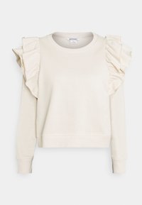 Cremefärgad sweatshirt med rynkade detaljer på axlarna, långa ärmar och rundad halsringning. Mjukt tyg med avslappnad passform.