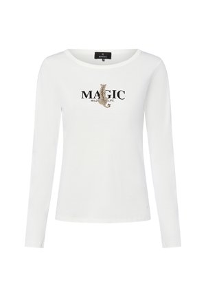 White long-sleeve shirt featuring a round neckline and a printed design with the text "MAGIC WILD LIFE" and an animal silhouette.