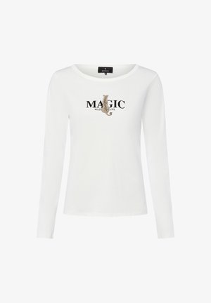 White long-sleeve shirt featuring a round neckline and a printed design with the text "MAGIC WILD LIFE" and an animal silhouette.