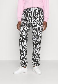 CHIARA FERRAGNI Teplákové kalhoty - white