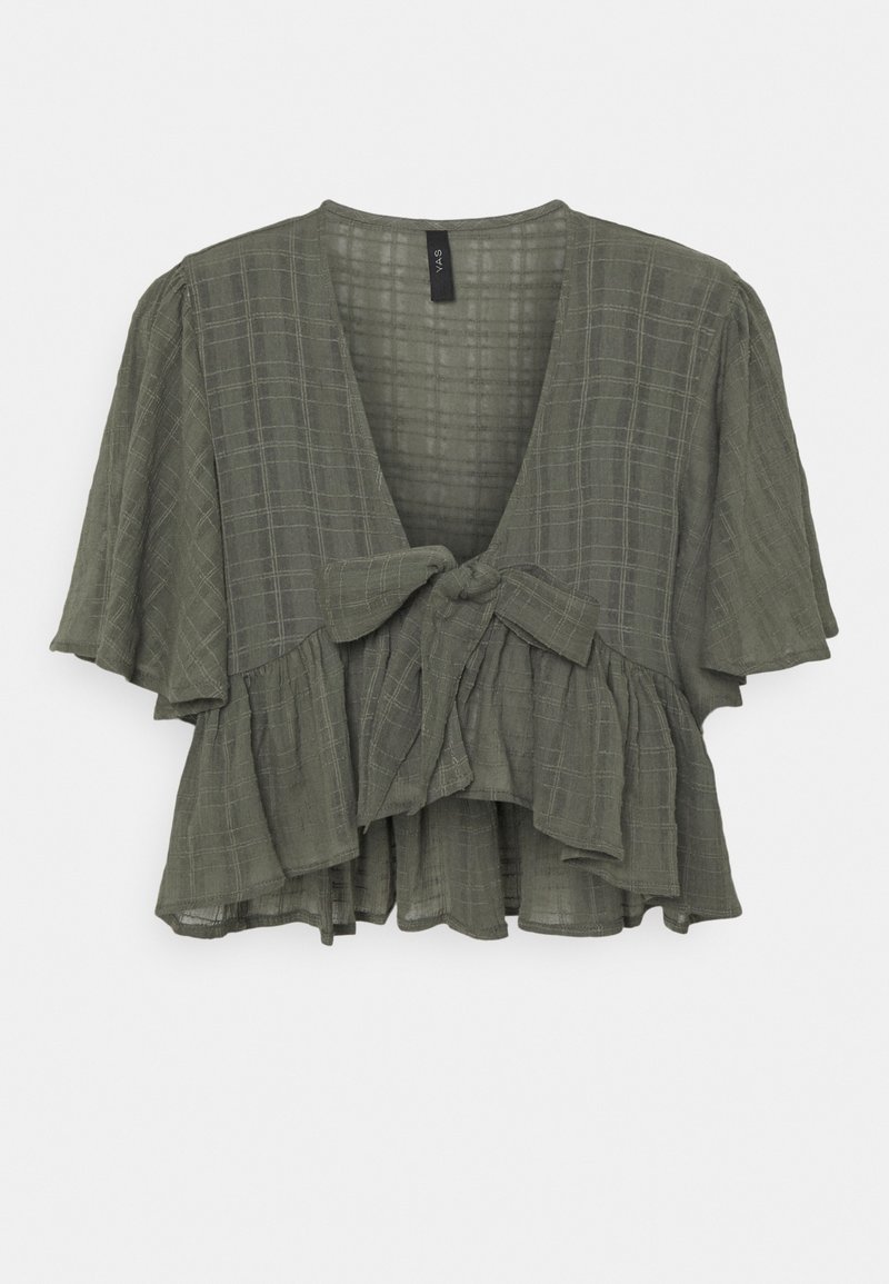 Short-sleeve, olive green blouse with a v-neck, tied front detail, ruffled hem, and a checkered pattern throughout. Lightweight fabric.