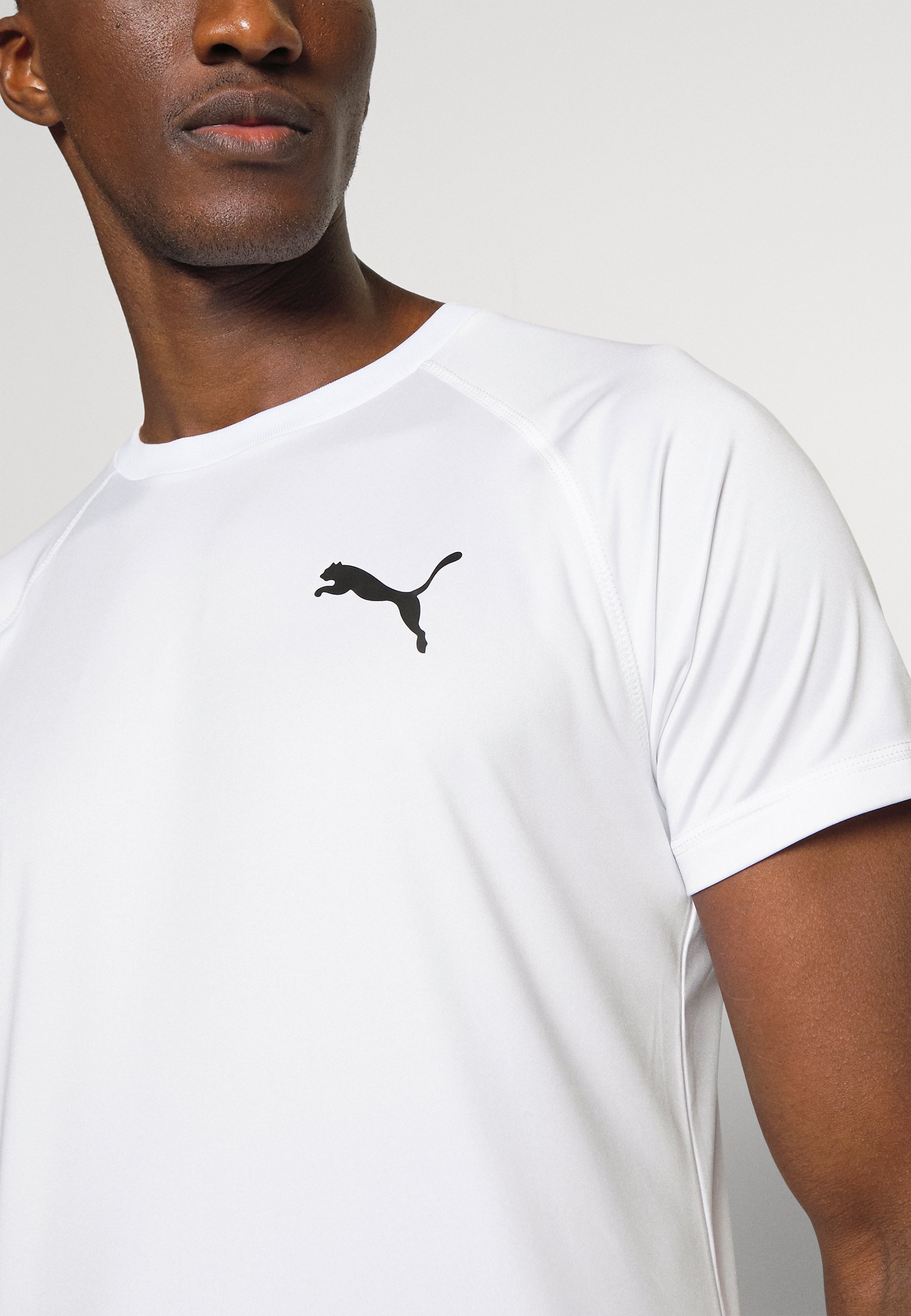 Puma TEE - Print T-shirt - puma white 