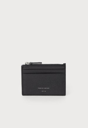 Black leather cardholder with a textured surface, zipper closure, multiple card slots, and embossed logo on the front.