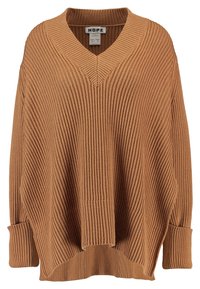 Löst sittande, ribbat stickat camelbrunt tröja med V-ringning och vikta fållar, märkt "HOPE" i damstorlek 36/ herrstorlek 44.