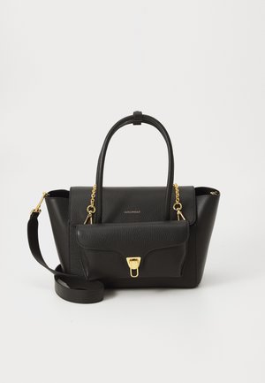 Black leather handbag with dual handles and a detachable shoulder strap, featuring a front pocket secured with a gold clasp. Gold hardware accents.