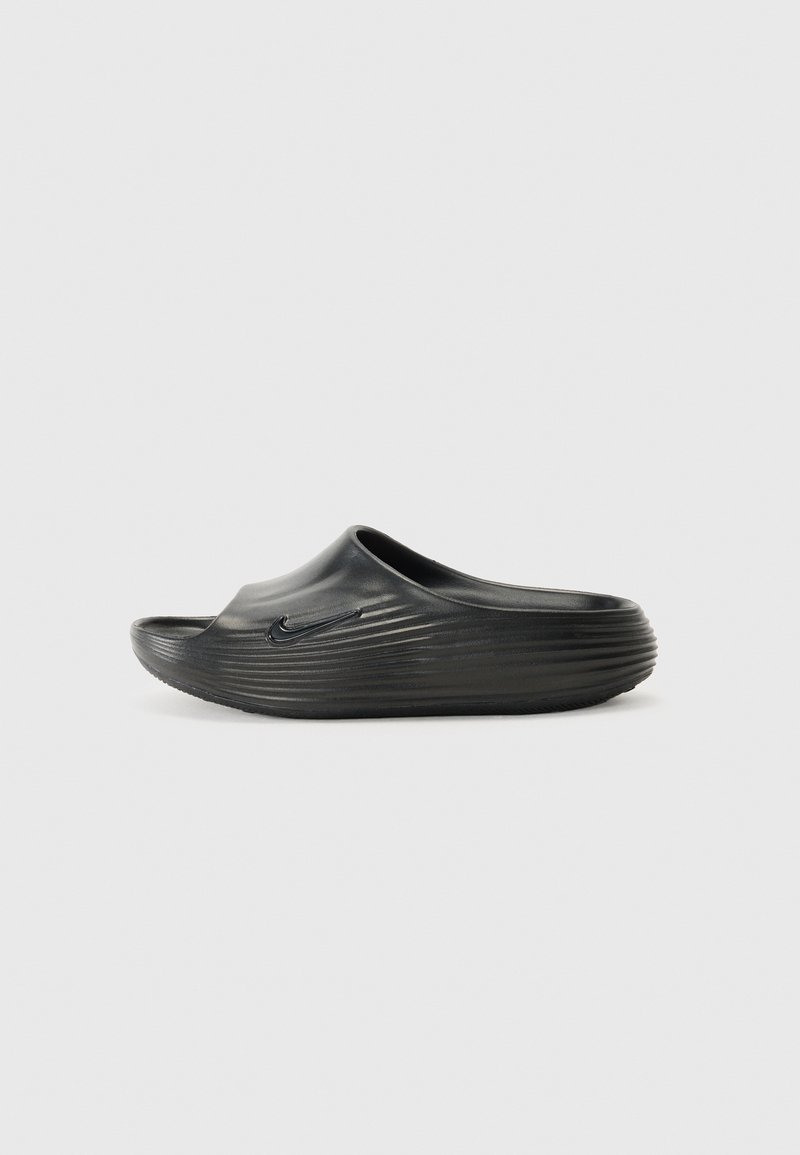 Must must sandaal must black rubber, sile pind undrow, ümar toe, ja lainud nuud peal. Omab väikest logo küljel.