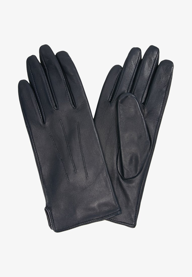 Guanti in pelle nera con una texture liscia. Presentano tre cuciture verticali sul retro e una vestibilità aderente attorno al polso.