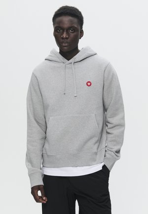Gray hoodie made of cotton blend fabric, featuring a front pocket, adjustable drawstring hood, and a small red logo on the chest.
