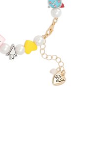 Colorful charm bracelet featuring pearl beads, shaped charms, and a gold metal clasp with an engraved heart tag reading "BJ."