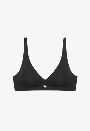 Zwarte draadloze beha met een diepe V-hals, gemaakt van gladde stof, met subtiel logodetail in het midden en brede verstelbare banden.
