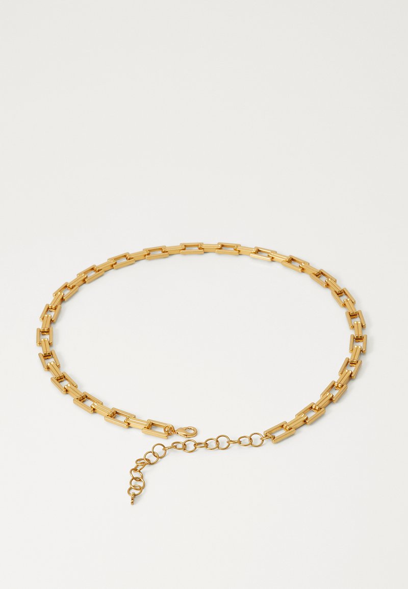 Gold metal chain necklace features rectangular links, a lobster clasp, and an adjustable chain extension for varied lengths.