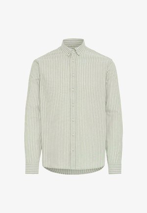 Triibuline nööpidega särk helerohelises ja valges, millel on klassikaline krae, pikad varrukad ja kaardus äärejoon. Valmistatud puuvillakangast.