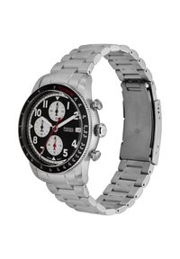 Montre chronographe en acier inoxydable argenté avec un cadran noir, trois sous-cadrans et un tachymètre. Équipée d'un bracelet et d'un fermoir métalliques.