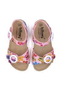 Sandales roses avec motifs floraux et papillons, brides blanches réglables, et semelle en liège. Conçues pour les enfants, taille 24.