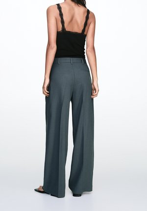 Spodnie materiałowe