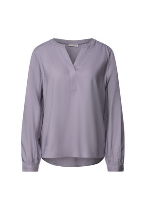 Lavender long-sleeve blouse with a v-neck, relaxed fit, and gathered sleeves. Made of smooth fabric with a subtle sheen, no visible patterns.