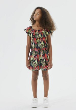 Robe en imprimé floral avec un décolleté volanté, des motifs de feuilles colorés en rouge, vert et marine, avec une taille élastique et une longueur courte.