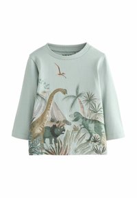Jasnoniebieska dziecięca koszula z długim rękawem z nadrukiem dinozaurów i roślin prehistorycznych, przedstawiająca brachiozaura, triceratopsa, tyranozaura i pterodaktyla.