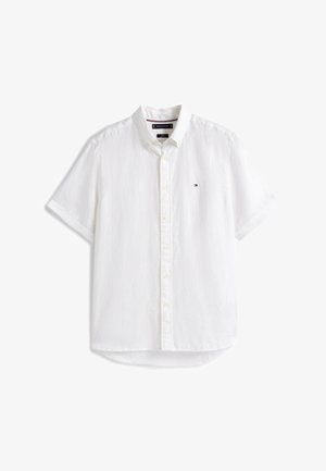 White short-sleeve button-up shirt with collar and small Tommy Hilfiger logo on the left chest.
