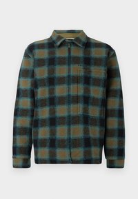 Koszula flanelowa w kratę w odcieniach brązu, czerni i teal; z pełnym zamkiem błyskawicznym, kołnierzykiem oraz małym logo na piersi; miękka tekstura, długie rękawy.