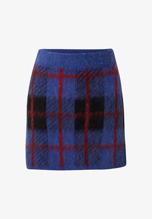 Korte wollen rok in het blauw met een rood en zwart geruit patroon. Heeft een geribbelde tailleband en een recht model. Zachte textuur en warme uitstraling.