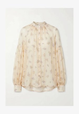 Blusa crema a maniche lunghe con stampa floreale alla lavanda, colletto alto, chiusura con bottoni sul davanti e tessuto arricciato su spalle e polsini.