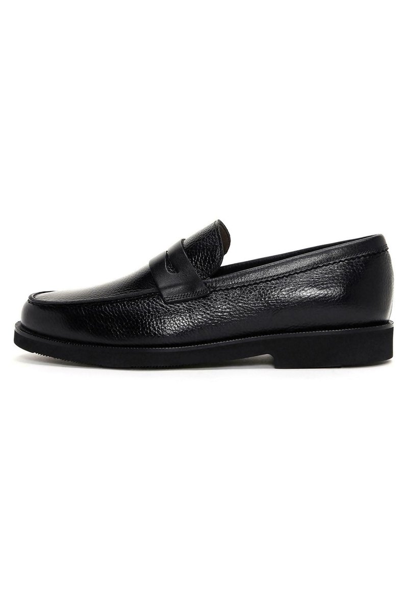 Black leather loafers with a textured finish, rounded toe, and a stitched band across the front. Low flat sole with minimal tread.