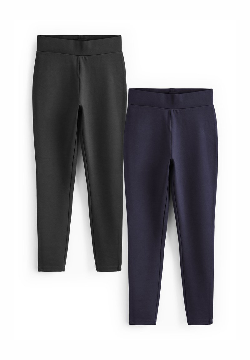 Két leggings pár: az egyik fekete, a másik tengerészkék. Széles derékpánttal, sima textúrával és alakra simuló szabással rendelkeznek.