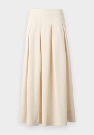 Μίντι φούστα σε κρεμ χρώμα με πιέτες, ψηλή ζώνη μέσης και λεπτή λεπτομέρεια λογότυπου στο πάνω δεξί μέρος.