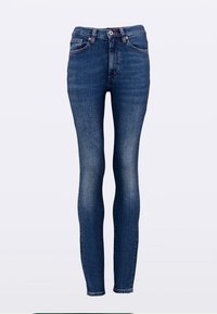 Tievās džinsa bikses tumši zilā krāsā ar augstu vidukli un gludu struktūru. Aprīkotas ar piecām kabatām un sudraba krāsas metāla detaļām. Klasisks dizains.