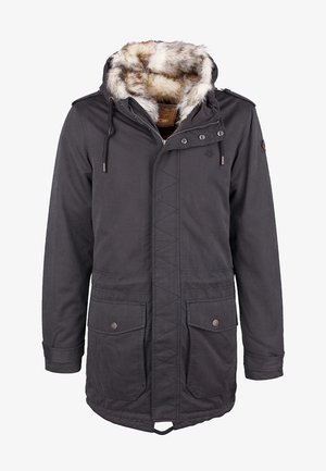 Lang sort parka-jakke med en hætte foret med kunstpels, to forlommer, trykknapper og snore i taljen. Har en tekstureret, mat overflade.