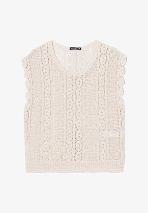 Top in pizzo all'uncinetto di colore crema con orlo a scallop, maniche corte e scollatura rotonda con leggero taglio a V sulla schiena.