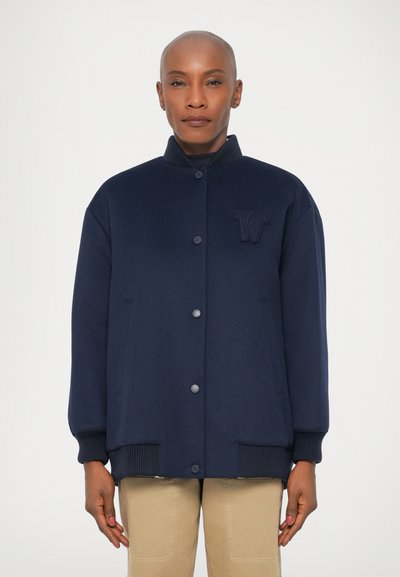 Navy blue bomber jacket, wool blend, ribbed collar and cuffs, front button closure, embroidered "W" logo on left chest, relaxed fit.