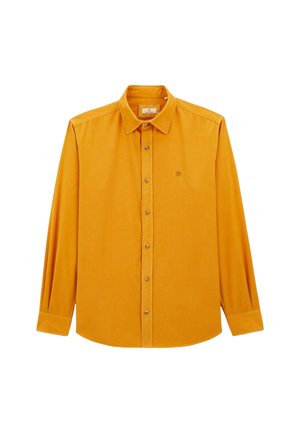 Chemise à manches longues en coton jaune moutarde avec un devant à boutons, un col pointu et un petit logo sur la poitrine.