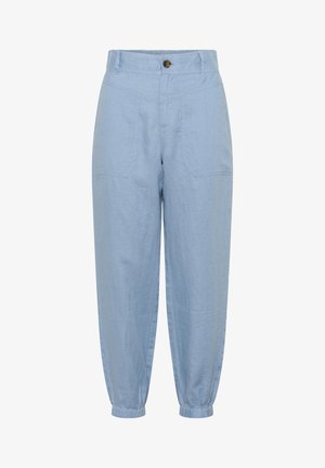 Ljusblå linbyxor med dragsko i midjan, elastiska cuffs och två framfickor med snedställda sömmar.