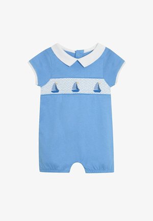 Salopetă scurtă, cu mânecă scurtă, de culoare albastră, cu guler alb, având bărci cu vele brodate pe o bandă modelată de dedesubt. Fabricată dintr-un material de bumbac moale.