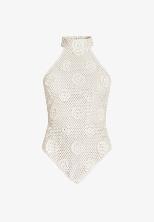 White crocheted halter neck bodysuit with floral patterns and openwork mesh design, featuring a high collar and a fitted silhouette.