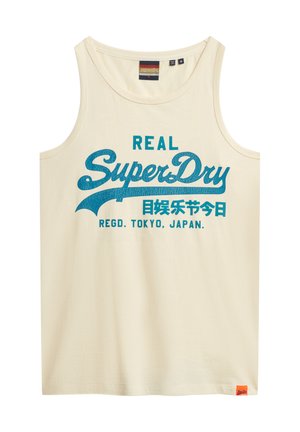 Débardeur crème à coupe décontractée, avec un imprimé texturé bleu qui indique "REAL SuperDry" et une étiquette orange sur l'ourlet.