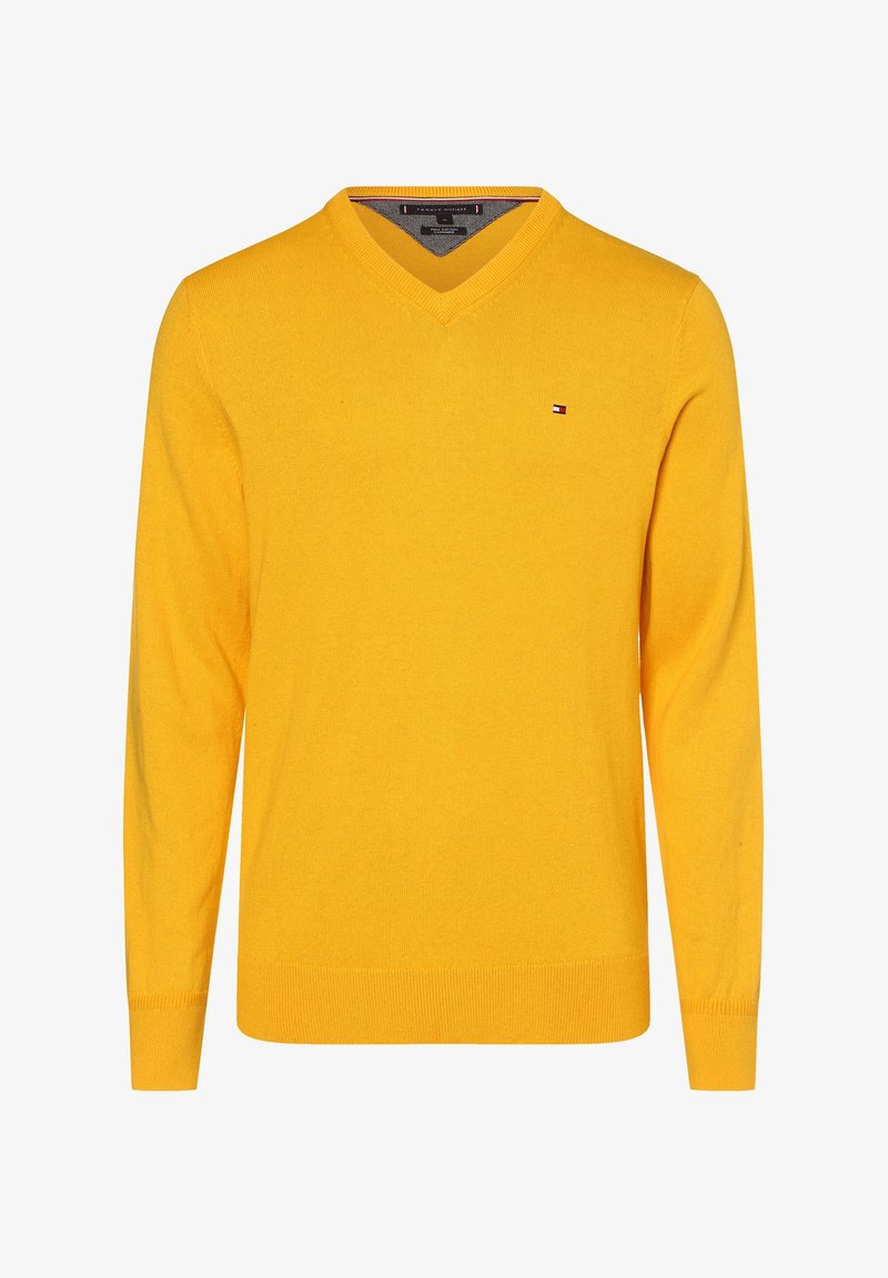 Pull jaune à manches longues avec col en V, petit logo Tommy Hilfiger sur la poitrine gauche, poignets et ourlet côtelés.
