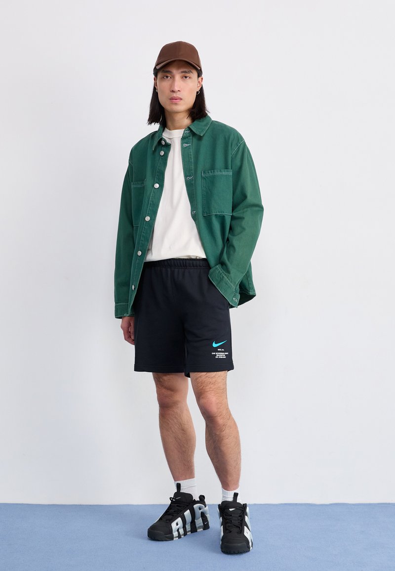 Nike Sportswear Pantaloni sportivi black/nero Zalando