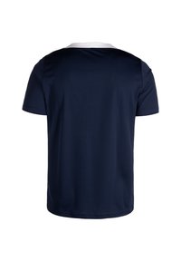 Polo a maniche corte blu navy con colletto bianco, tessuto testurizzato e orlo dritto senza ulteriori decorazioni.