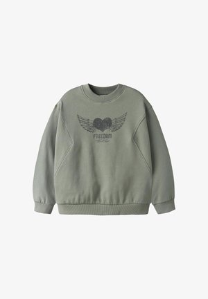 Sweat-shirt vert olive clair avec un motif de cœur ailé et le texte "FREEDOM World Tour" sur le devant, avec des poignets et un ourlet côtelés.